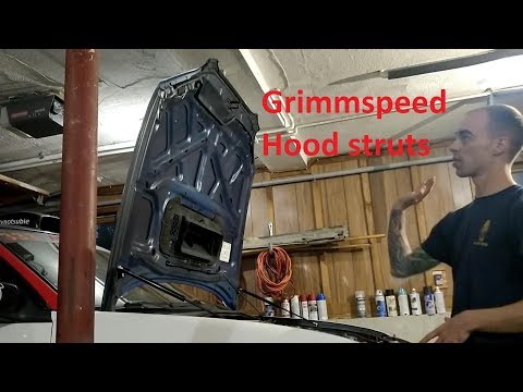 Grimmspeed hood strut install on a Subaru