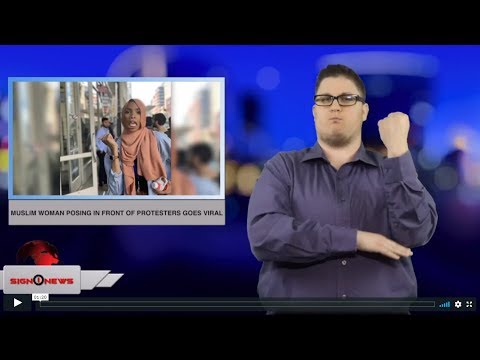 Muslim woman posing in front of protesters goes viral (ASL - 4.24.19)