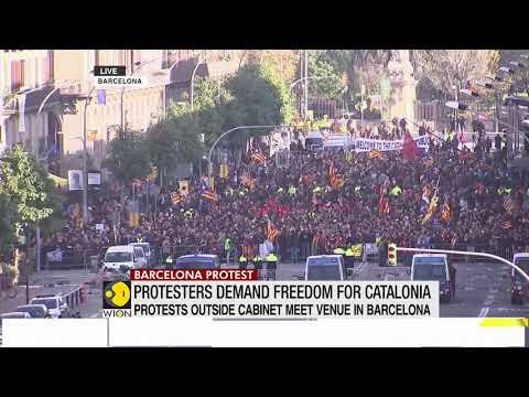 Catalonia protesters block roads for PM's visit