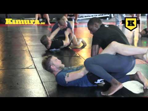 Alexander Gustafsson wrestles with Phil Davis