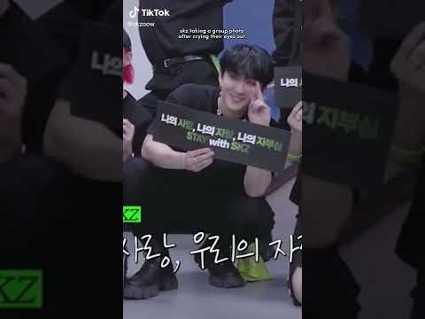 Stray Kids taking a picture right after crying their eyes out