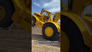 Cat 660 scraper doing wheelies. #letsmakescrapersgreatagain