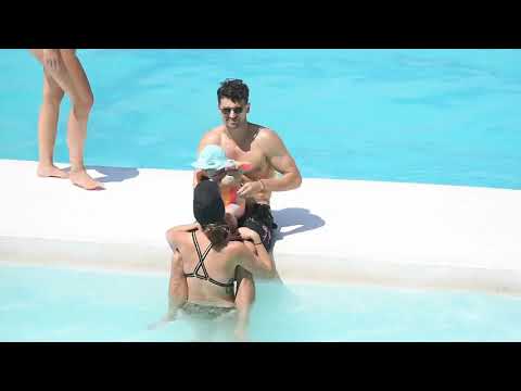 Matty j and Laura Byrne enjoy at day at the pool