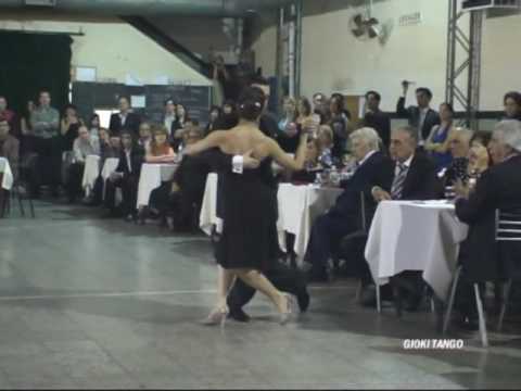  Paola Tacchetti  and  Alejandro Hermida  are  dancing  to  the  tango  "  Quiero Verte Una Vez Mas  "