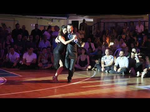  Javier Rodriguez  and  Moira Castellano  are  dancing  to  the  milonga  "  Por la Güella  "  by  Rodolfo Biagi  at  A los amigos tango festival  in  2019