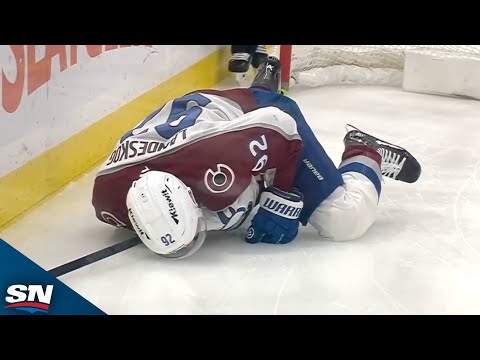 Avalanche's Gabriel Landeskog Assisted Off The Ice After Hard Collision Into Post