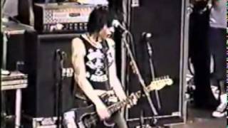 The Distillers The World Comes Tumblin&#39; Live