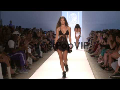 Models walk the runway during  Anna Kosturova / Beach Rio...