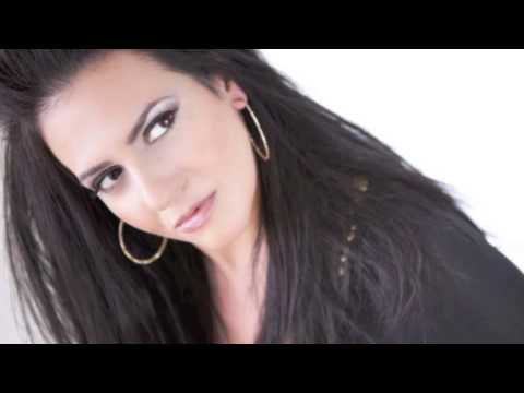 Gina Zavalis  ~ "You're Not From Here" by Lara Fabian
