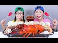 Pedas makanan laut rebus Lobster Mukbang DONA Indonesia