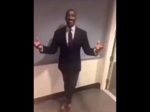 Black Guy In Suit Sitting Meme