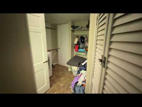 Home-Like Living with Sunroom, Attached Garage & In-Unit Laundry property video
