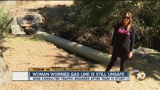 Team 10 Update: Fallbrook woman still worried about exposed 30-inch pipe in yard