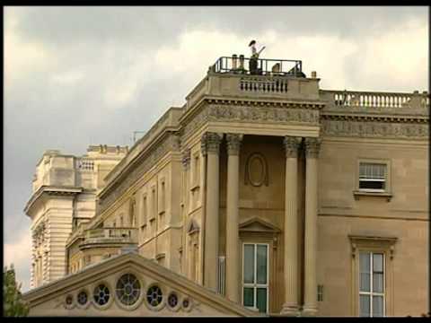 Brian May on the roof of Buckingham Palace