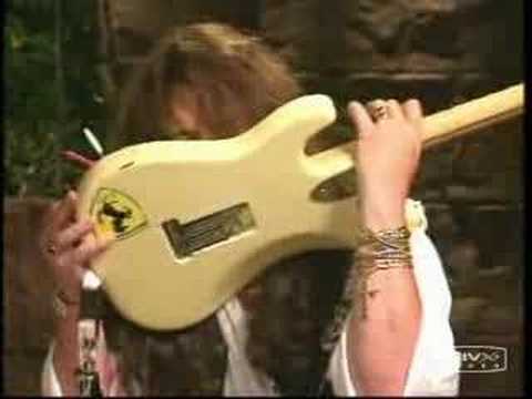 Malmsteen does tremolo picking with his teeth