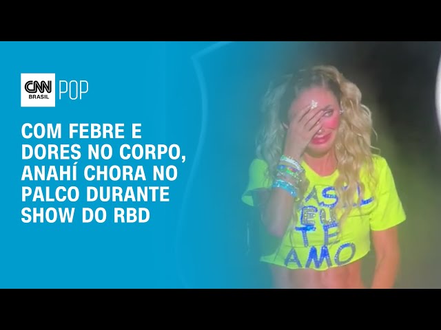 Com febre e dores no corpo, Anahi chora em show do RBD