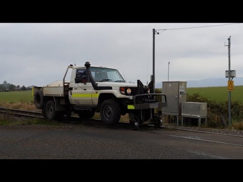 TasRail HV21 Hi-Rail vehicle crossing Evandale Road