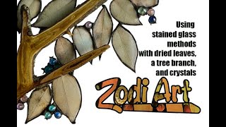 Using Stained glass methods with dried leaves, a tree branch and crystals