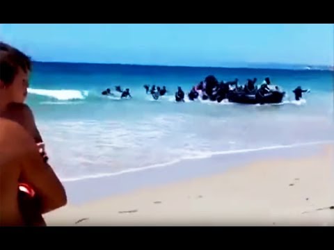 Shocked Beachgoers Watch As Illegal Muslim Migrants From Africa Swarm Spanish Beach August 2017