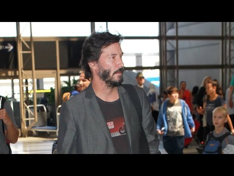 Keanu Reeves Takes Tons Of Photos For Fans On His 51st Birthday