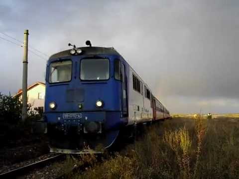 P 7036 Urziceni - Bucuresti Nord with a rainbow, 14.10.2010