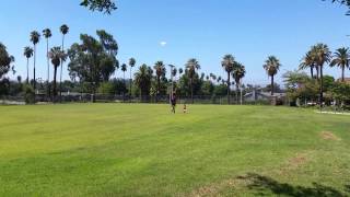 Sophia flying a kite with Dadda