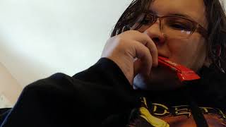 Razor eats a kit kat like a psychopath to Mrs Claus is A Bad Bitch by Yung Asparagus