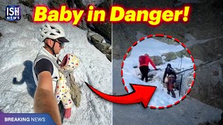 Couple Climbs Frozen Mountain with 9-month-old baby