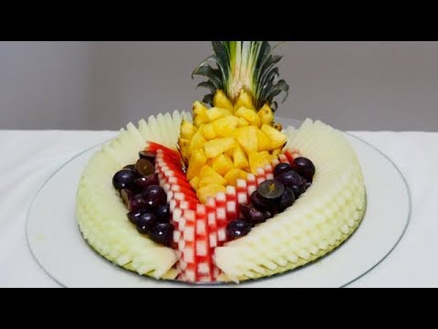 CUT WATERMELON, MELON, GRAPES AND PINEAPPLE AND MAKE A WONDERFUL FRUIT CENTER