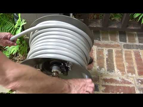 ELEY model 1042 free-standing hose reel demonstration of pulling out and reeling in the hose.