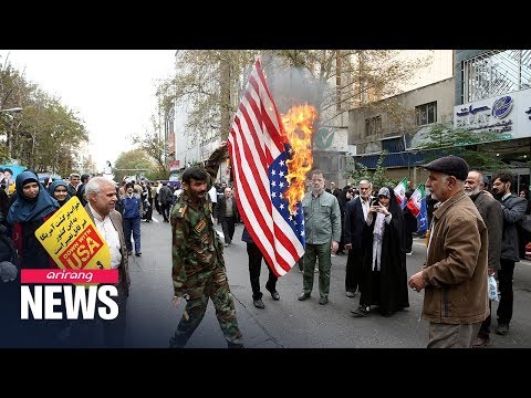 Tens of thousands rally in anti-U.S. protest outside former embassy in Tehran