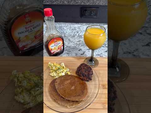 Mrs Netta is cooking Charles breakfast and burned it up