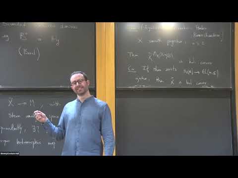 Constructing Holomorphic Functions on Universal Coverings of Complex Algebraic Varieties