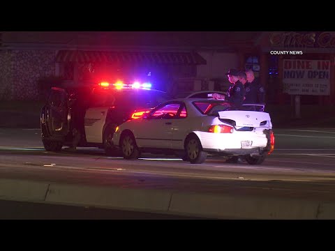 Suspected DUI Driver Crashes Into Car, Forces It Into Police Vehicle | Tustin, CA