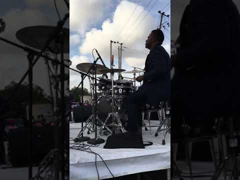Playing a drum solo during a praise jam with dagruva band