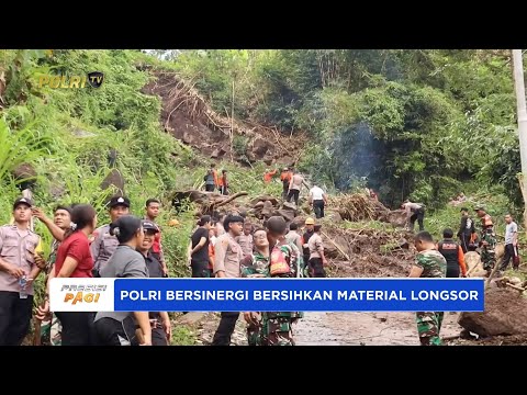 POLRES KLUNGKUNG BERSINERGI BERSIHKAN MATERIAL LONGSOR DI BUKIT ABAH