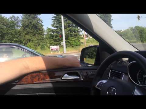 Mercedes GL550 vs Subaru Sti