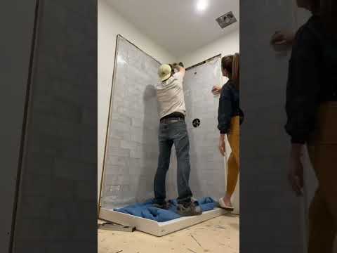 Husband and wife tackle utile shower by maxx. It’s as easy as it looks!!!