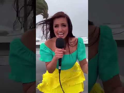 Reporter vs. Wind: Epic Battle! 😂🌪️
