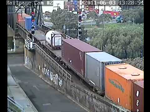 2 x NR class locomotives lead a crew car and container service from Melbourne 3-6-2011