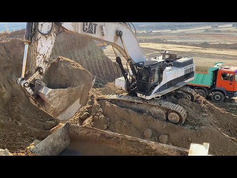 Caterpillar 375 Excavator Loading Mercedes And MAN Trucks