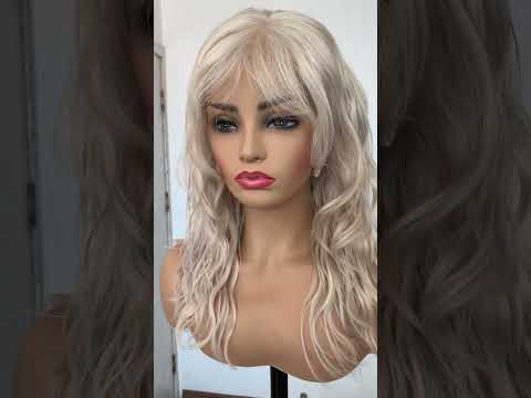 Blonde loose curly human hair wig with bangs for...