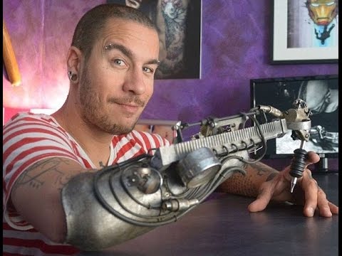 The Terminator - Amputee gets world's first prosthetic arm fitted with a TATTOO GUN