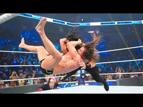 Riddle hits an RKO out of nowhere on Roman Reigns