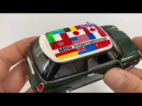 Металлическая машинка Kinsmart 1:28 «Mini Cooper S (С принтом флага)» KT5059DF инерционная / Зеленый