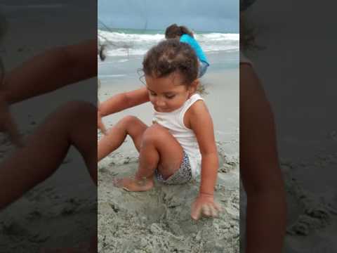 Adalynn happy to be on the beach