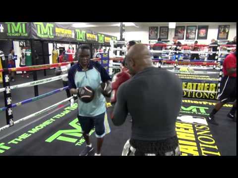 Derek Edwards on pads with Jeff Mayweather