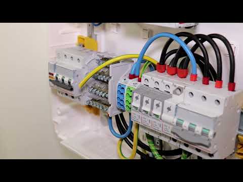 Electrical distribution board, connection of differential circuit breakers with distribution bloc...