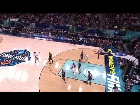 Laeticia Amihere throws the ball to a teammate at the scorer’s table