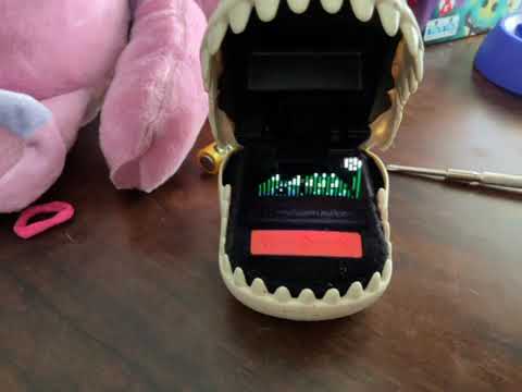 Changing batteries to bitzee Jurassic World